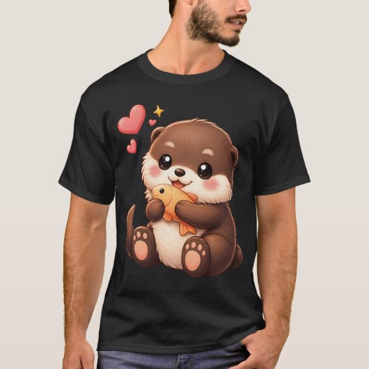 かわいい赤ちゃんカワウソが魚を持っている Tシャツ (正面)
