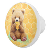 かわいい赤ちゃんクマが蜂蜜を食べている セラミックノブ (右)