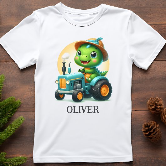 かわいい赤ちゃんティラノサウルスが青いトラクターを運転 Tシャツ