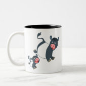 かわいい遊マンガのベルテッドゲロウェイ牛と子牛 ツートーンマグカップ (左)