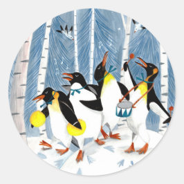 かわいい青いミュージシャンのペンギンたちが雪で遊ぶ楽しいホリデーカード ラウンドシール