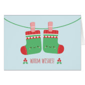 かわいい願いのクリスマスのソックスの挨拶状を暖めて下さい (正面横)