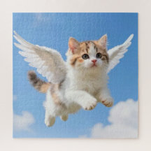 かわいい飛ぶ子猫 三毛猫 ブルー空
