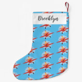 かわいい鳥飛んでいる赤い飛行機の漫画イラストレーション スモールクリスマスストッキング (裏面)