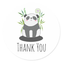 かわいい黒と白のパンダを竹に