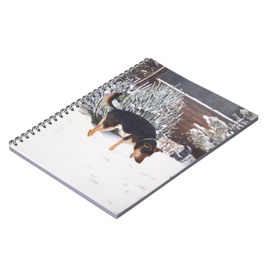 かわいい黒犬とタン犬の冬の雪のシーン ノートブック (左側)