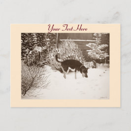 かわいい黒犬とタン犬の冬の雪のシーン ポストカード