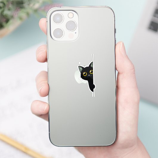 かわいい黒猫がコーナーから顔をのぞかせる | 楽しい シール (スマートフォン)
