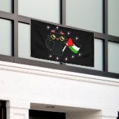かわいい黒猫がパレスチナの旗を持っている 横断幕 (ビルの外側)