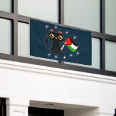 かわいい黒猫がパレスチナの旗を持っている 横断幕 (ビルの外側)