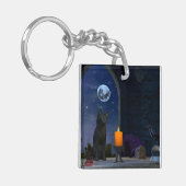 かわいい黒猫がローソクを見つめる キーホルダー (正面左)