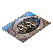 かわいくおもしろいなアライグマの冬の雪のノート ノートブック (左側)