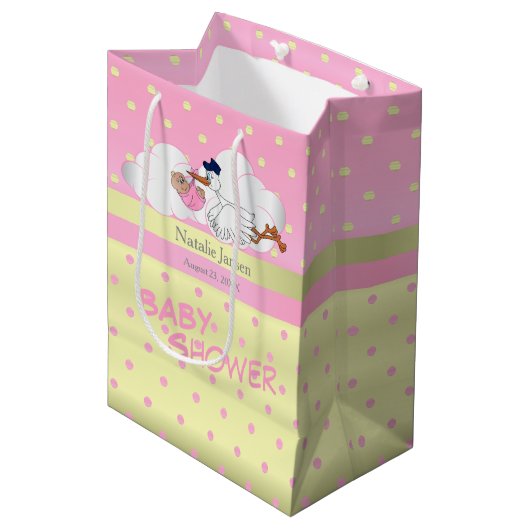 かわいく小さい女の赤ちゃんを持つこうのとり ミディアムペーパーバッグ (正面アングル)