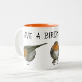 かわいく赤いロビン鳥のコーヒー・マグのイラストレーション ツートーンマグカップ (正面左)