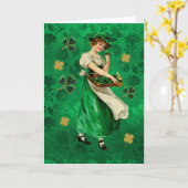 かわいらしいアイルランドの少女;ラッシーの緑及び金ゴールドの花柄のシャムロック カード (黄色い花)
