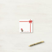 かわいらしいサンタ帽子の赤いパーソナライズされた弓 ポストイット (デスク上)