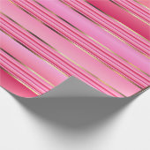 かわいらしいピンクおよび金ゴールドは縞で飾ります ラッピングペーパー (角)