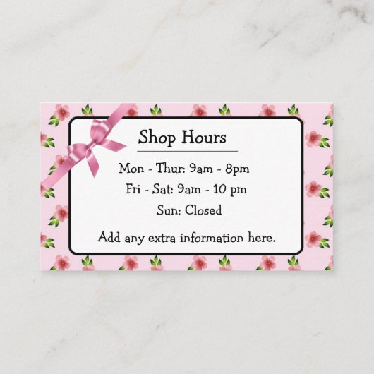 かわいらしいピンクの花柄及び弓名刺 名刺 (裏面)