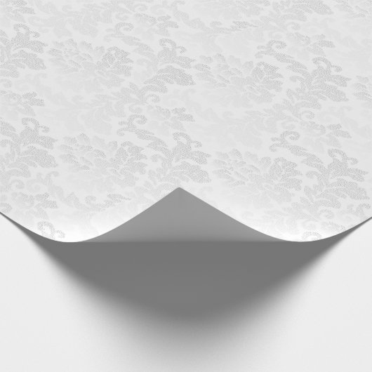 かわいらしい花の白いダマスク織の結婚式のデザイン ラッピングペーパー (角)