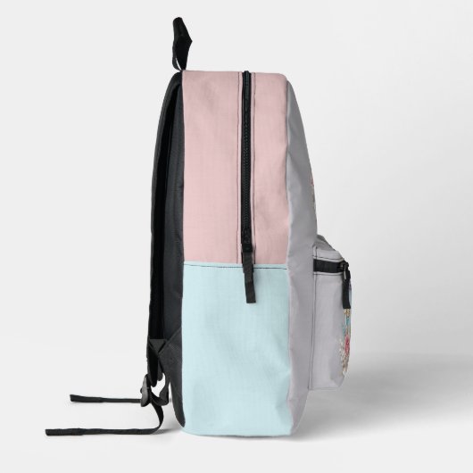 かわいらしヴィンテージモノグラムのフローラ プリントバックパック (左)