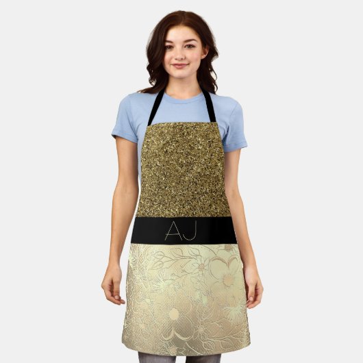 きらきら光るきらきら光る金ゴールドグリッターと黒フローライニシャル エプロン (着用した状態)
