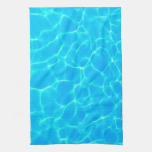 きらめく青いプールの水の反射の写真 キッチンタオル