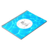 きらめく青いプールの水の反射の写真 ノートブック (左側)