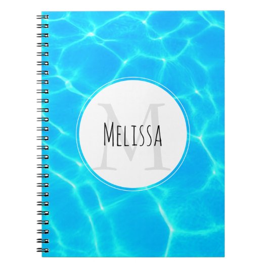 きらめく青いプールの水の反射の写真 ノートブック (正面)