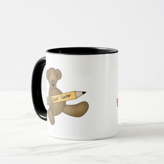 くまおよび鉛筆のベストの先生 マグカップ (正面左)