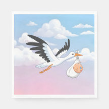 くもりの空を飛ぶコウノトリと赤ちゃん