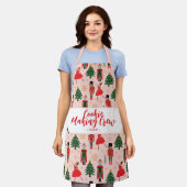 くるみクラッカーかわいいピンクのクリスマス エプロン (着用した状態)