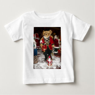 くるみクラッカーテディベアのクリスマス ベビーTシャツ