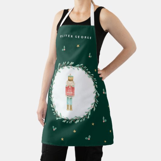 くるみ割り緑色の植物性かわいいクリスマス エプロン (インサイチュ)