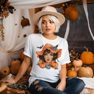 こうもりとカボチャの若い女性 Tシャツ