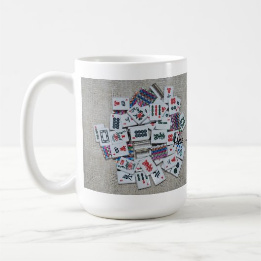 ここにジョーカーベージュmahのjonggのマグのリボンのタイル コーヒーマグカップ (左)