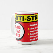 ここの反ストレスのキットの強打の頭部は襲います コーヒーマグカップ (正面左)
