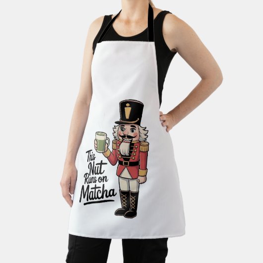 このナットは抹茶走クリスマスナツクラッカーの上にある エプロン (インサイチュ)