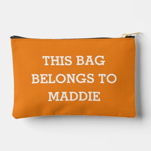 このバッグは化粧品ポーチの名前に属している アクセサリーポーチ (裏面)