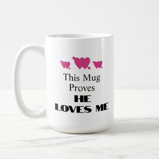 このマグカップは彼が私を愛していることを証明している コーヒーマグカップ (左)
