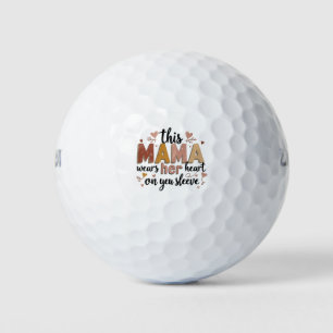 このママは袖にハートを着てる ゴルフボール