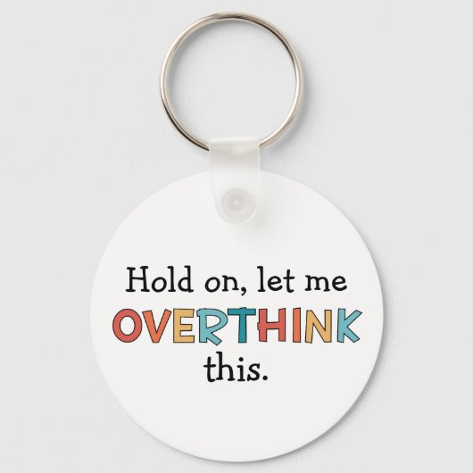 このレトロを考え過ぎさせてくれおもしろい キーホルダー (裏面)