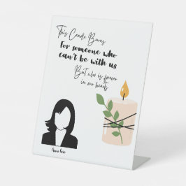 このロウソクは愛情のこもった記憶の台座の看板に燃える 台座サイン