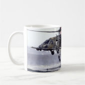 この人のオフィスのマグと比較される コーヒーマグカップ (左)