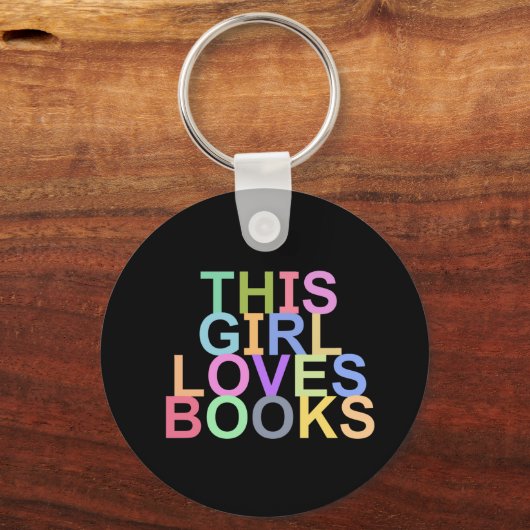 この女の子は本のキーチェーンが大好き キーホルダー (正面)