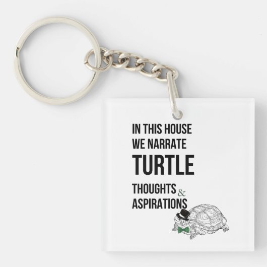 この家でカメおもしろいラバー引用文 キーホルダー (正面)