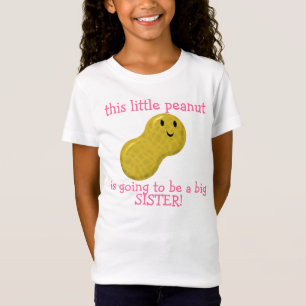 この小さいピーナツは姉であることを行っています Tシャツ