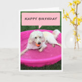 この泳いでいる子犬からのハッピーバースデー カード (黄色い花)