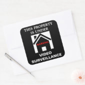 この物件は監視ステッカーの下にある スクエアシール (封筒)