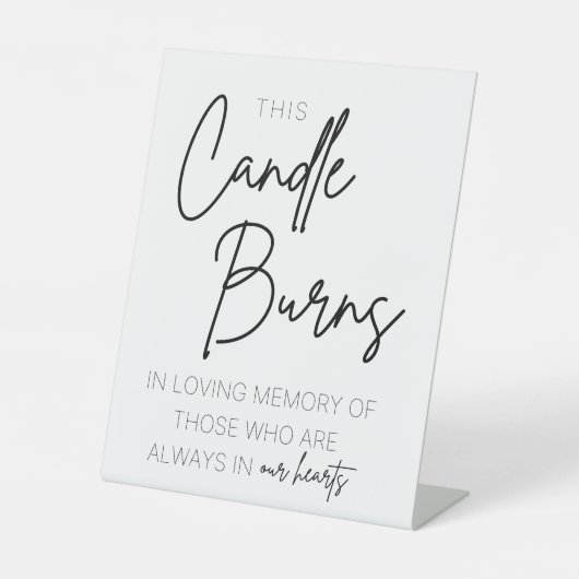 この蝋燭は台座の看板を燃やす 台座サイン (正面)