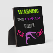 この警告体操選手は今まさに跳び出そうだ フォトプラーク (正面)